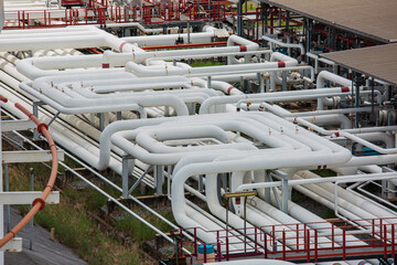 Steel long pipes and pipe elbow in station oil factory during refinery Petrochemistry industry