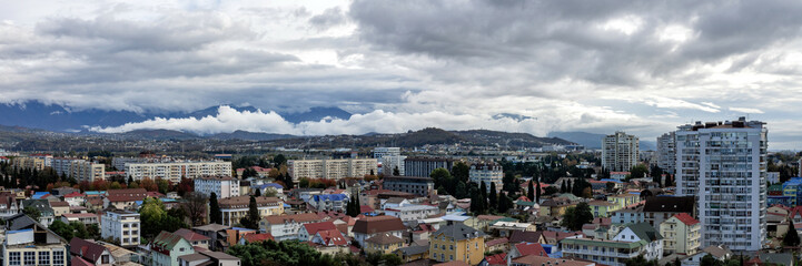 Fototapeta premium 01 panorama of the city of Adler with houses under construction