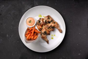 Tapaka chicken with fried potatoes