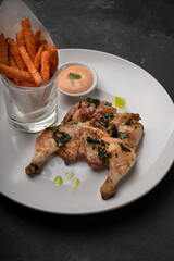 Tapaka chicken with fried potatoes