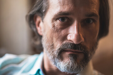 A portrait picture of a man feeling stressed and uncertain