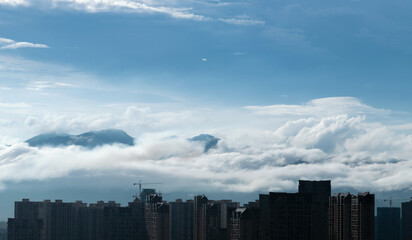Unfinished buildings under cloud sky