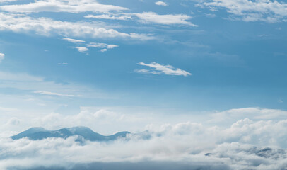 Fototapeta premium Aerial view of mountains with clouds