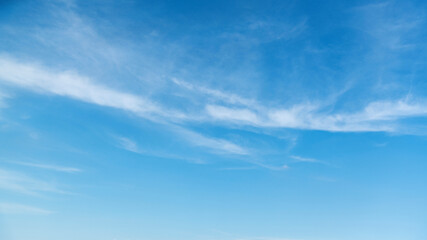 Blue sky with white clouds background