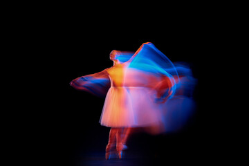Futurism, fantasy, miracle. Graceful and fragile ballerina in ballet dress in motion isolated over...