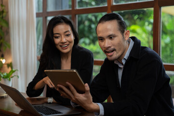 Business Women working on laptop computer. relexs working in cafe