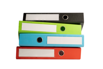 File Folder Binder stack of multi color on table in business office.