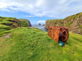 The cliffs and sea stacks at Port Challa on Tory Island, County Donegal, Ireland © Lukassek