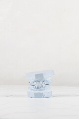 Close-up of a modern model of human jaws on a light white background. crooked teeth