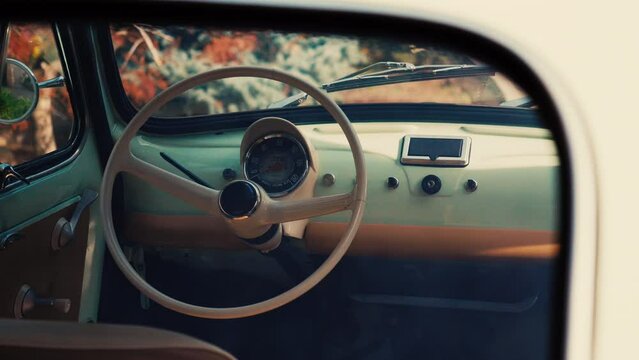 Tracking shot with the interior of an reconditioned old Fiat 500