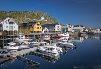 Fototapeta na wymiar Boats in the harbour at Nyksund, Vesteralen, Nordland, Norway