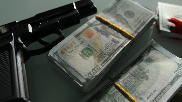 Money, blood and gun