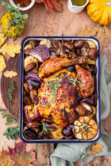 Roasted chicken with vegetables, herbs and chestnuts