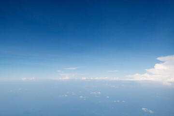 Fototapeta na wymiar Aerial view of sky above the clouds
