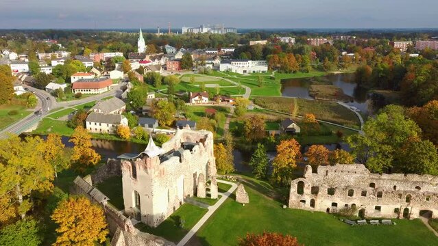 Beautifull Aerial Autumn Landscape of the Dobele City and Ruins of an Ancient Medieval Castle Dobele, Latvia. Camera Moves Sideward