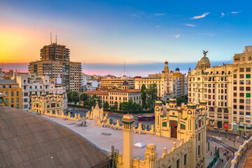 Fototapeta na wymiar Aerial view of Valencia city, Spain at sunset with bull arena.