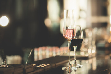 Champagne and wine glass on the bar restaurant dinning background
