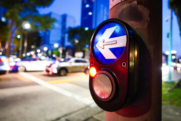 close up of crossing signal button in singapore 
