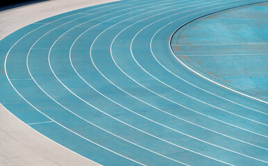 Fototapeta na wymiar Blue track in the stadium