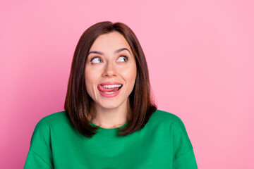 Photo of young charming positive lady toothy smile tongue out lick teeth have isolated on pink color background