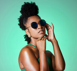 Fashion, beauty and retro black woman with sunglasses for vintage style, trend or eye protection....