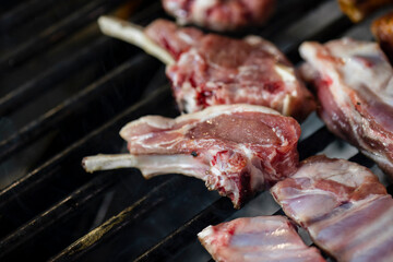 Closeup of grilling pork ribs, homemade barbecue.