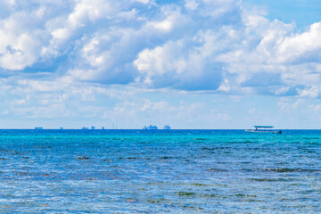 Boats yachts ship jetty beach in Playa del Carmen Mexico.