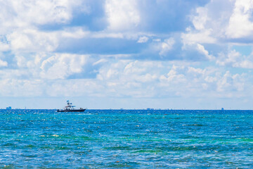 Boats yachts ship jetty beach in Playa del Carmen Mexico.