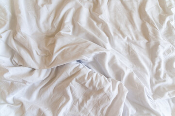 White crumpled sheet. View from above. Copy space