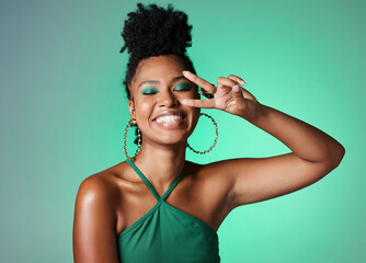 Peace sign hand, fashion and black woman on green studio background mockup with cosmetics and a...