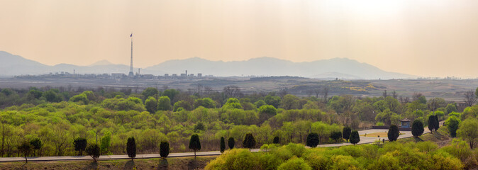 JOINT SECURITY AREA, PANMUNJEOM, SOUTH KOREA: tallest flag pole in the world with North Korean flag in Kijong-dong Village and site of the Axe Murder in the foreground