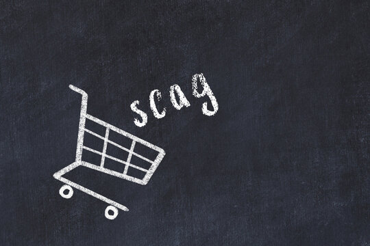 Chalk drawing of shopping cart and word scag on black chalboard. Concept of globalization and mass consuming