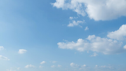 Naklejka na ściany i meble Blue sky with big white clouds