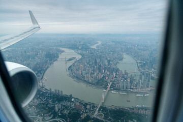 View of the city from the flying plane window