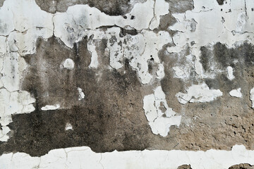 White paint peeling off from wall
