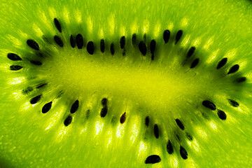 Close-up of kiwi pulp. Green fruit background. High quality photo
