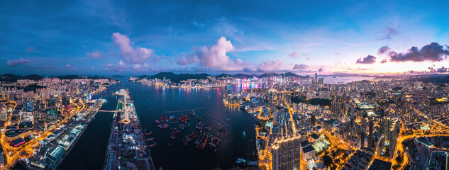 Futuristic cityscape, cyberpunk tone of metropolis, Kowloon, Hong Kong, Night aerial view
