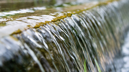 Water running down the stone step