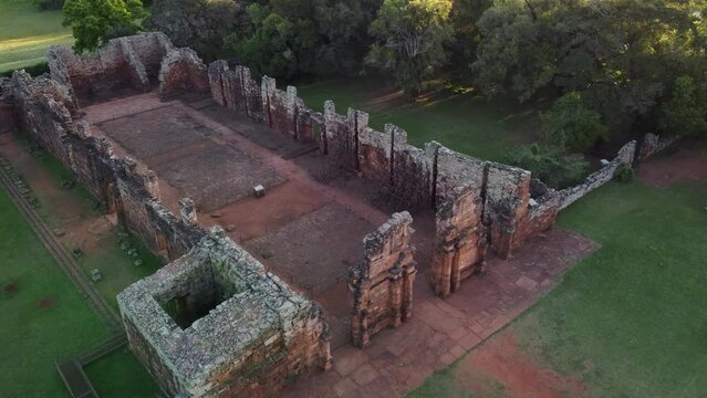 Side and top view of the church at the San Ignacio Jesuit mission ruins in Northern Argentina Aerial video
