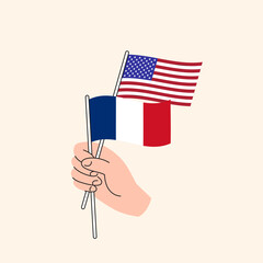 Cartoon Hand Holding United States And French Flags. US France Relationships. Concept of Diplomacy, Politics And Democratic Negotiations. Flat Design Isolated Vector