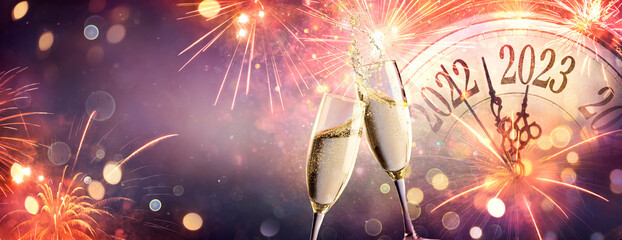2023 New Year Celebration With Champagne  - Countdown To Midnight - Clock Fireworks And Flutes On...