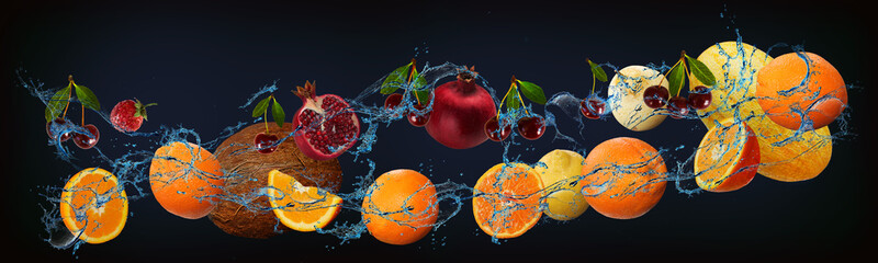 Panorama with fresh fruits in the water - melon, orange, pear, cherry, lemon, pomegranate, coconut,...