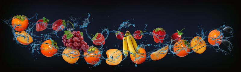Panorama with fresh fruits in the water - peach, kiwi, persimmon, strawberry, banana, grapes, a...