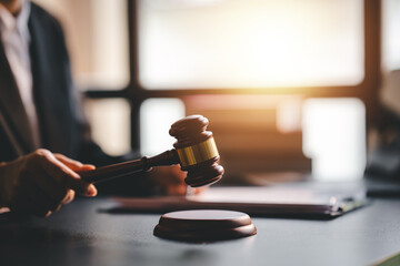 Close-up focussed on the judge hammer on the table. Lawyer. Court judge. Concept of court and...