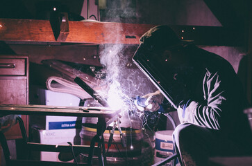 welder welding steel