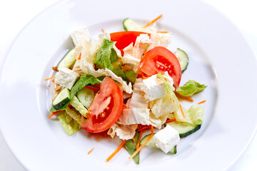 greek salad on the white plate