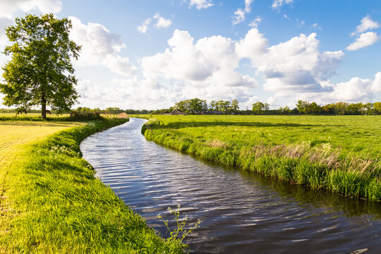 The river Barneveldse beek flows through the agricultural area near the village of Stoutenburg.