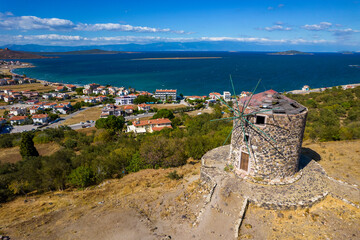 Fototapeta premium CUNDA ISLAND (Alibey Island) aerial view. Historical windmill in Cunda. Ayvalik, Balikesir, Turkey.