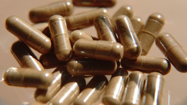 Tablets, capsules, antibiotics. Disease prevention. Treatment for colds and flu. Coronavirus. Receptor drugs. White and green pills.