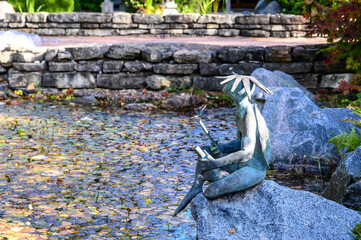 Kappa. Japanese Garden. botanical park in early autumn. Sunny Autumn Day